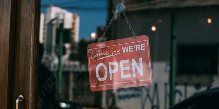 An 'Open For Business' sign.