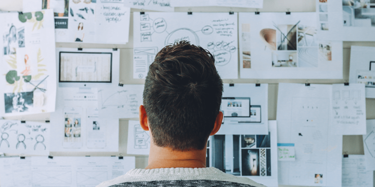 A man looking at a diagram.